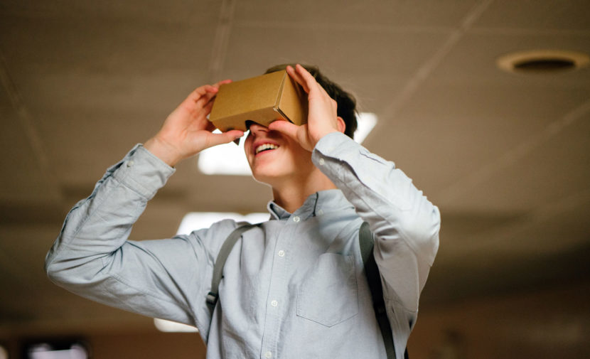 Man in Grey Dress Shirt Using Brown Cardboard Vr Glasses - Photo by mentatdgt from Pexels